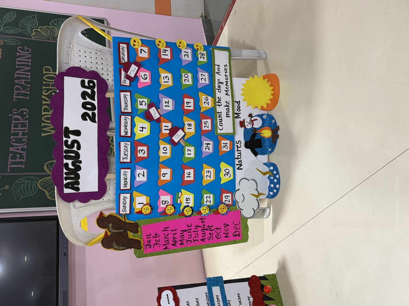 A handmade calendar teaching aid from a teacher training workshop