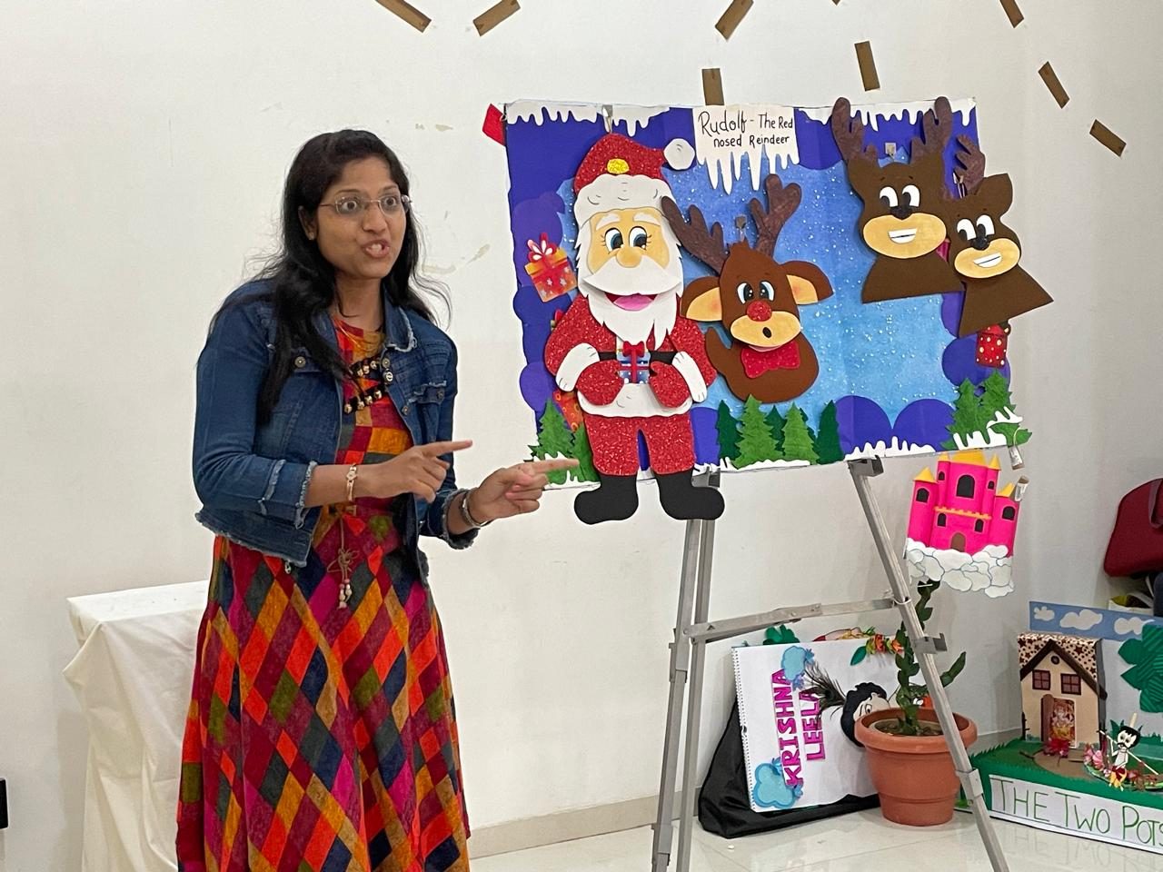 A trainee presenting her handmade teaching project